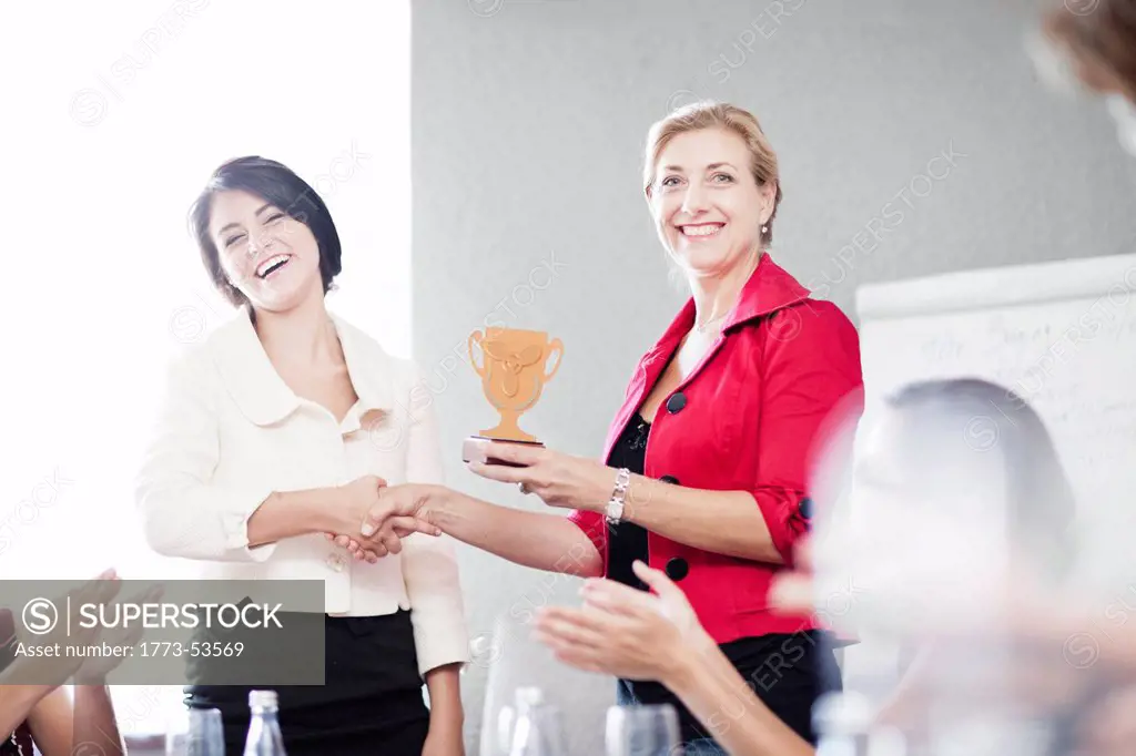 Businesswoman receiving award
