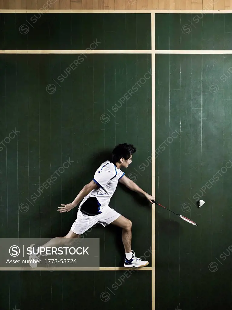 Badminton player lying on the floor