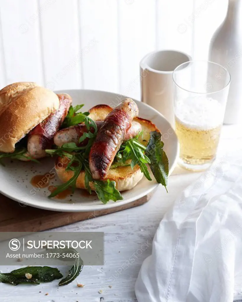 Plate of sausage saltimbocca sandwiches