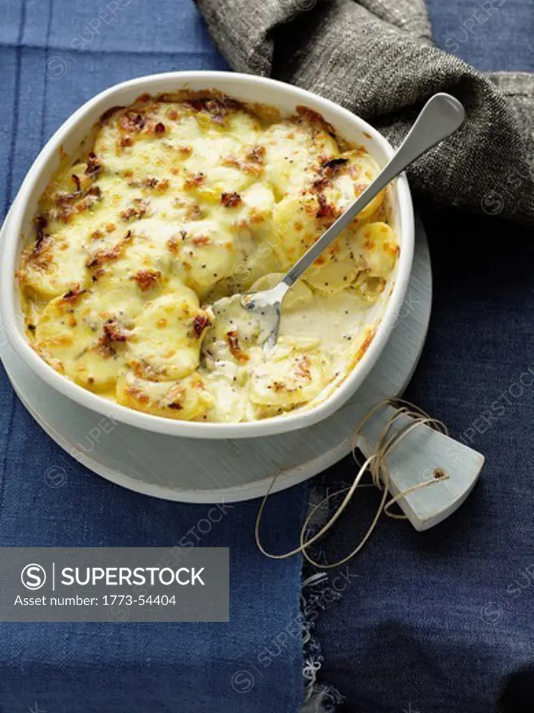 Sliced potato casserole with cheese
