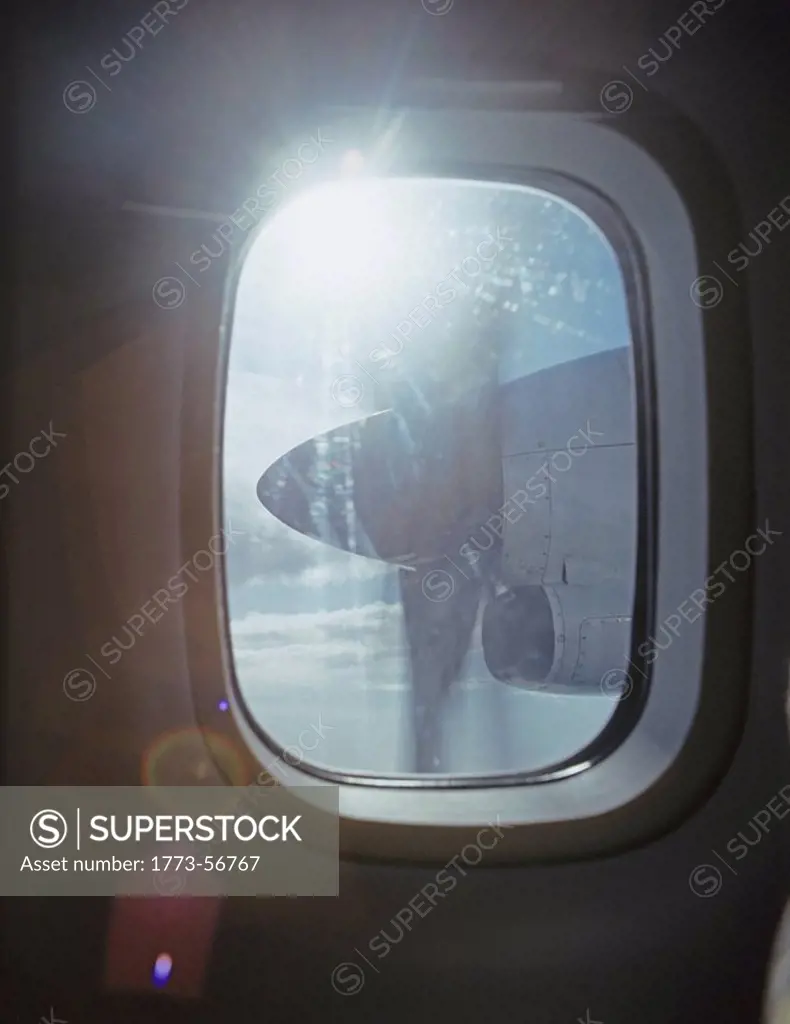 Aeroplane propeller seen trough window