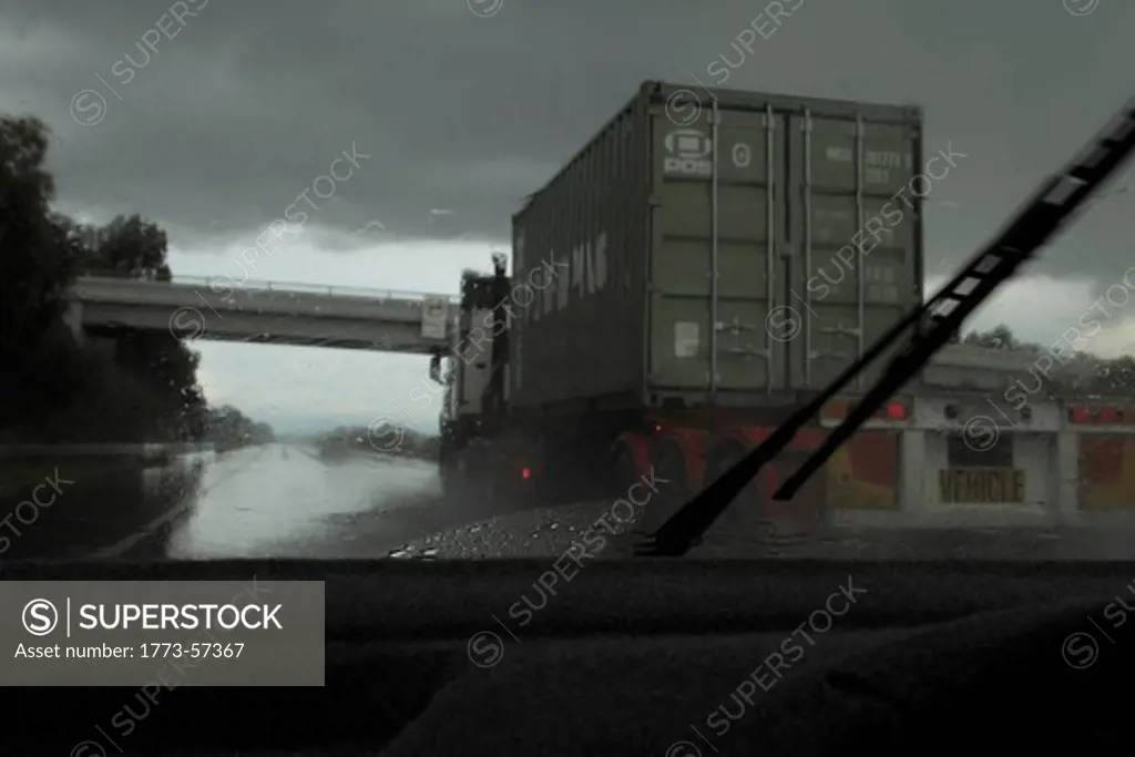 Shipping truck viewed from car