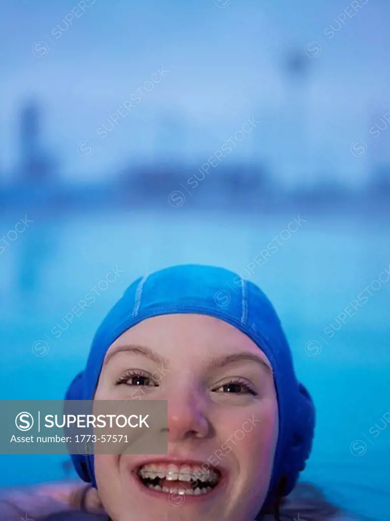 Woman in braces swimming