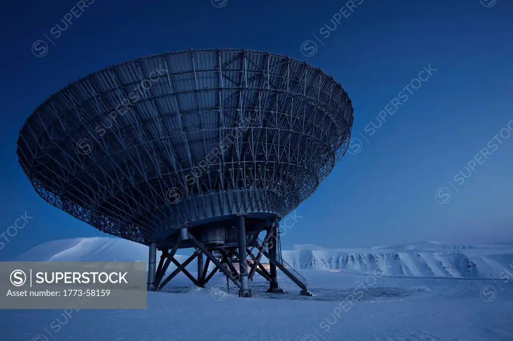 Satellite dish in snow_covered field