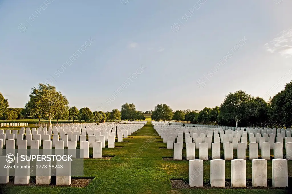 White headstones in graveyard
