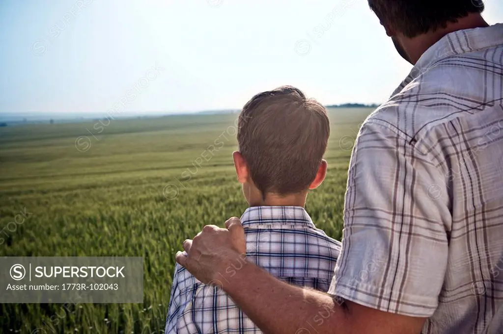 Father and son in wheat_field