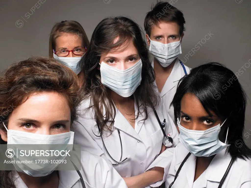 Group of young doctors wearing masks