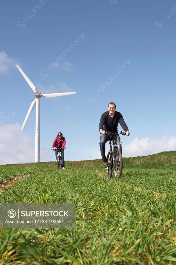 Couple riding bikes