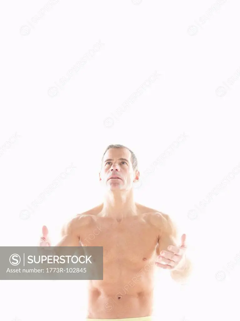 Mature man breathing exercises