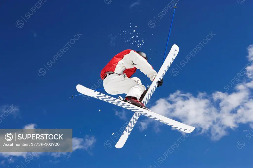 Skier performing jumping trick
