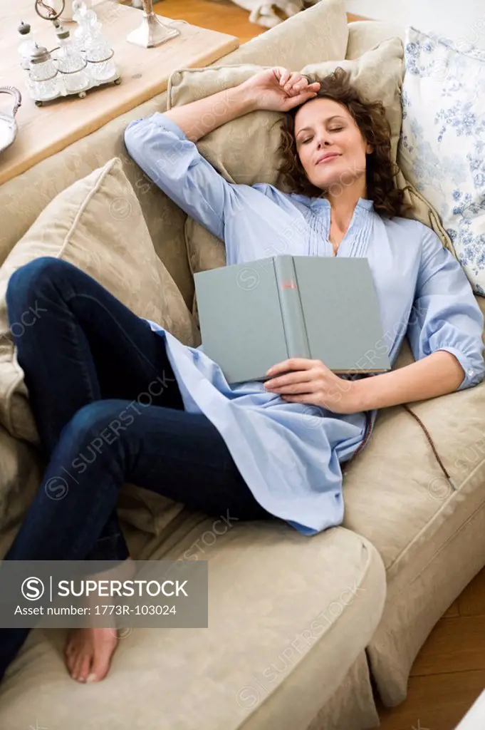 Woman sleeping on a couch