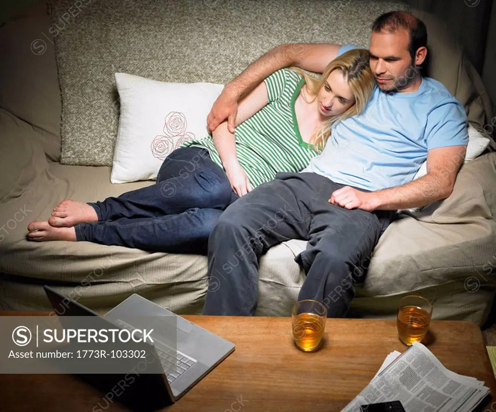 Young couple watching a movie