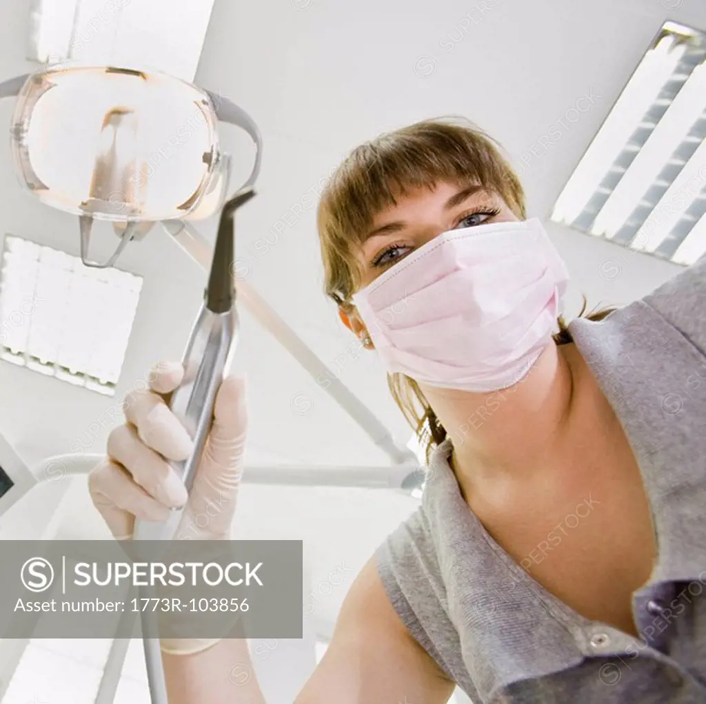 Dental assistant with dental tools