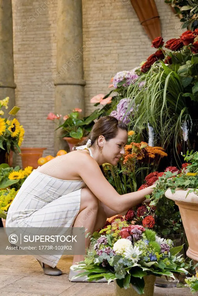 Woman shopping in a flower shop