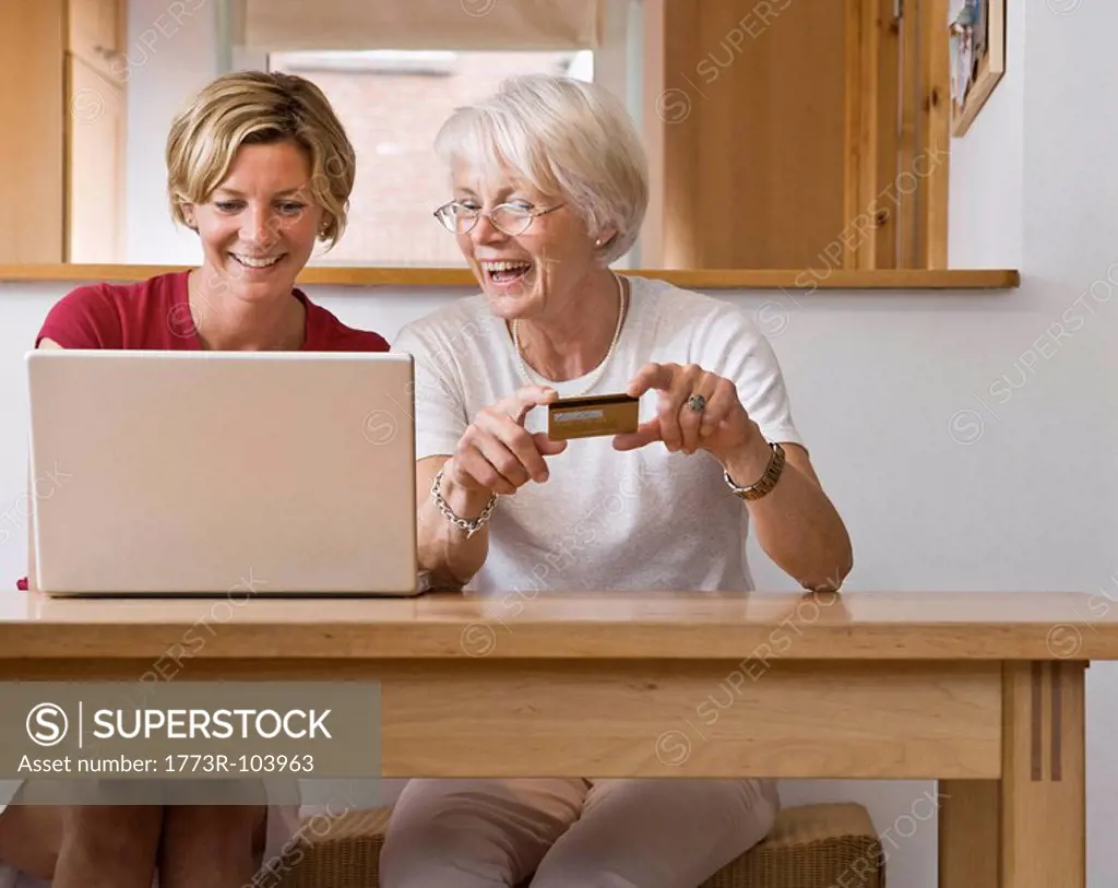 Women shopping on computer