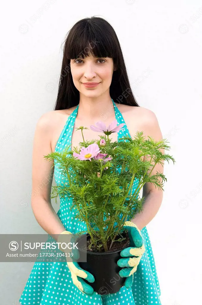 Woman holding plant