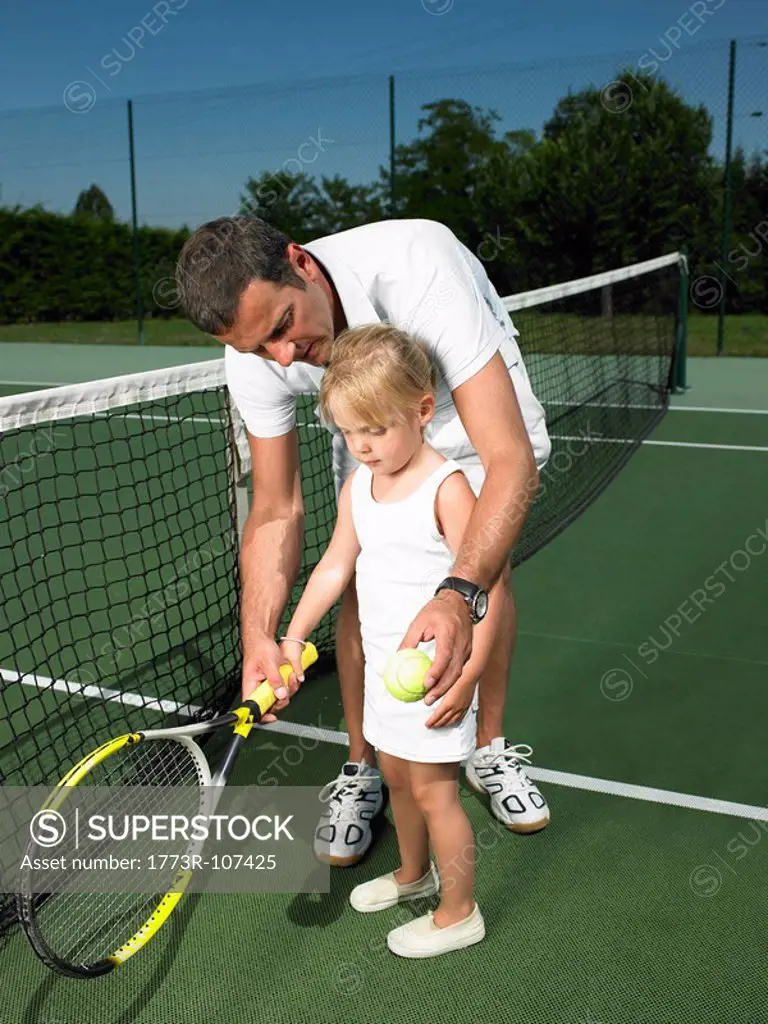 Tennis lesson for young child