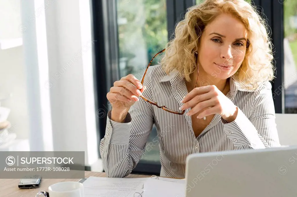 Woman working at office or home