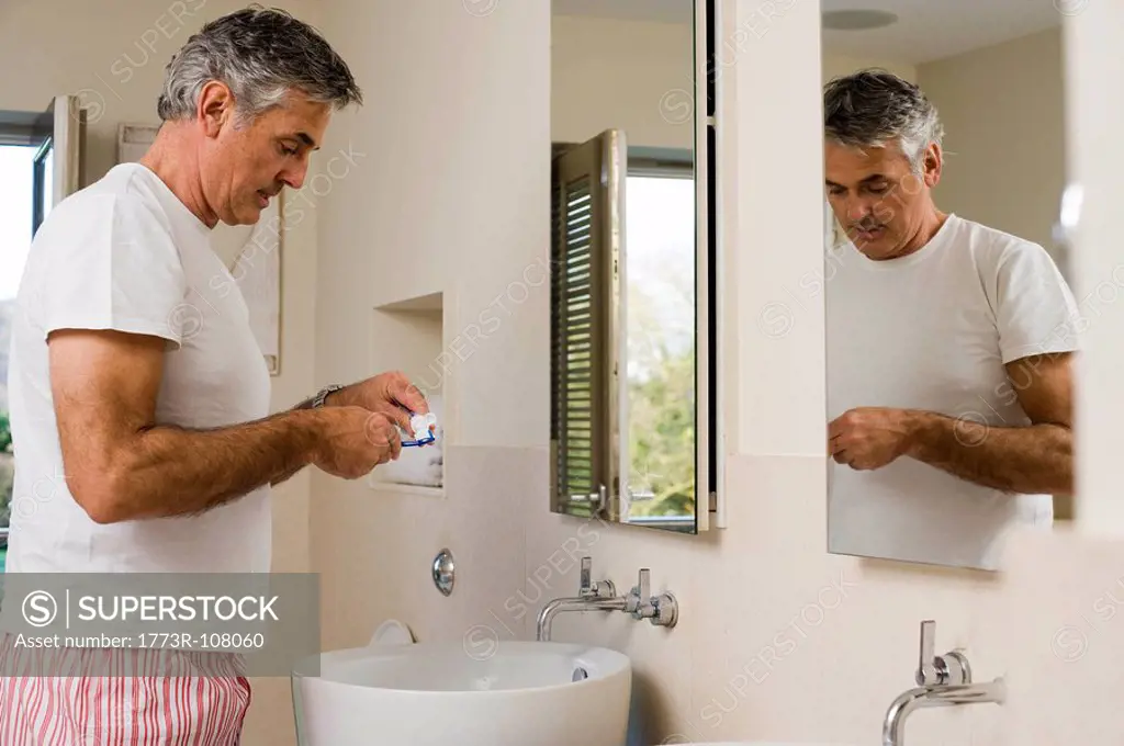 Man about to brush teeth