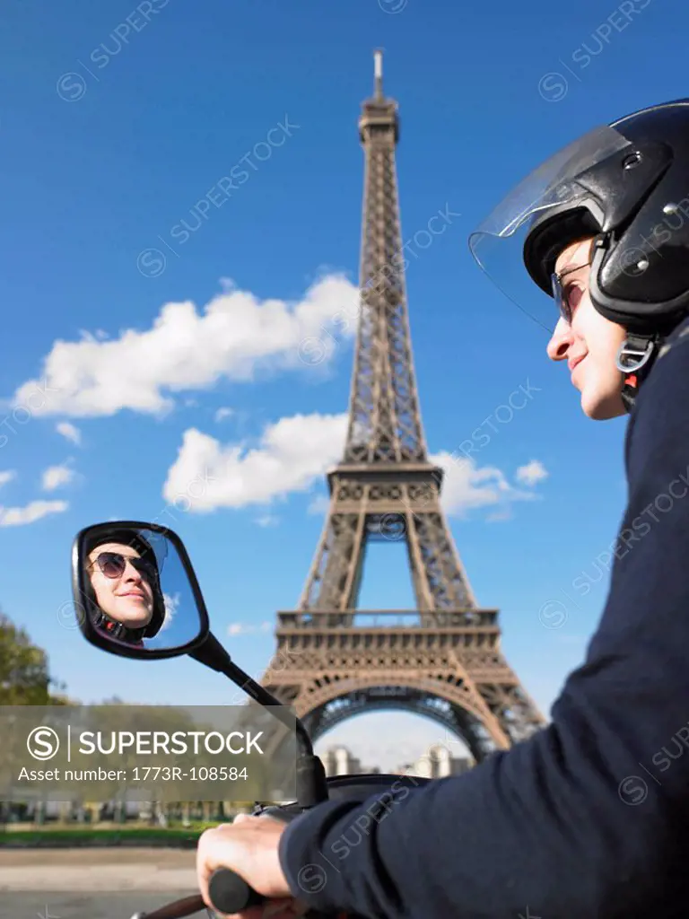 Man on moped in Paris