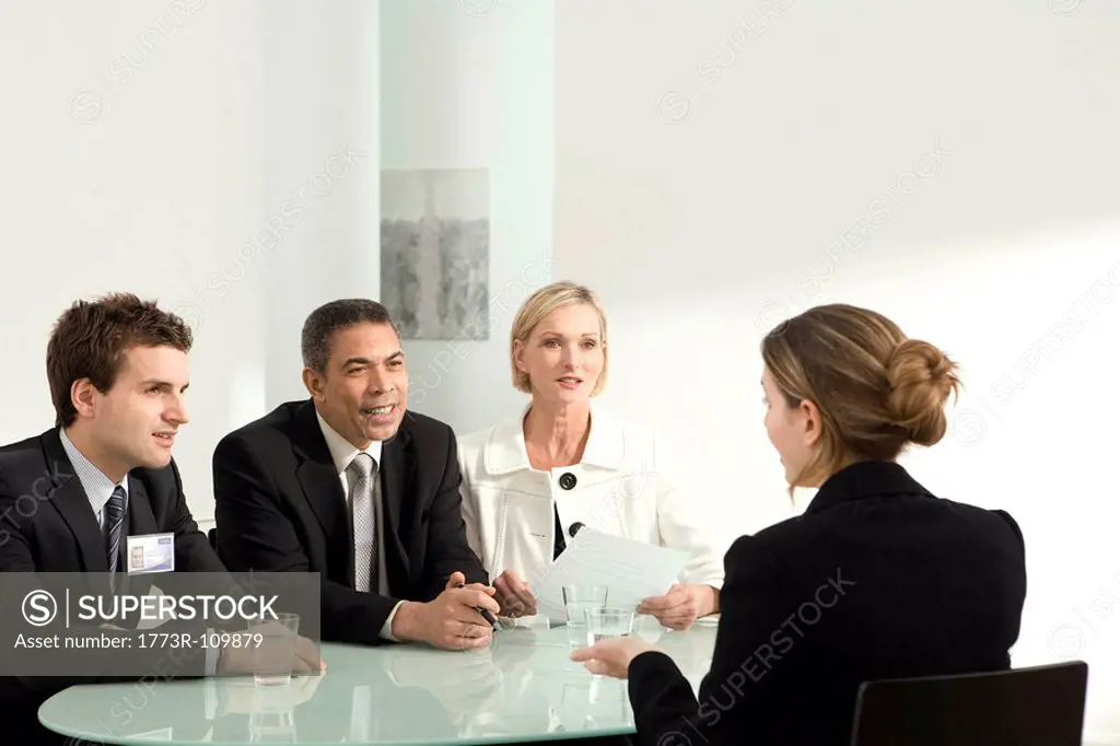 An interview in front of a panel