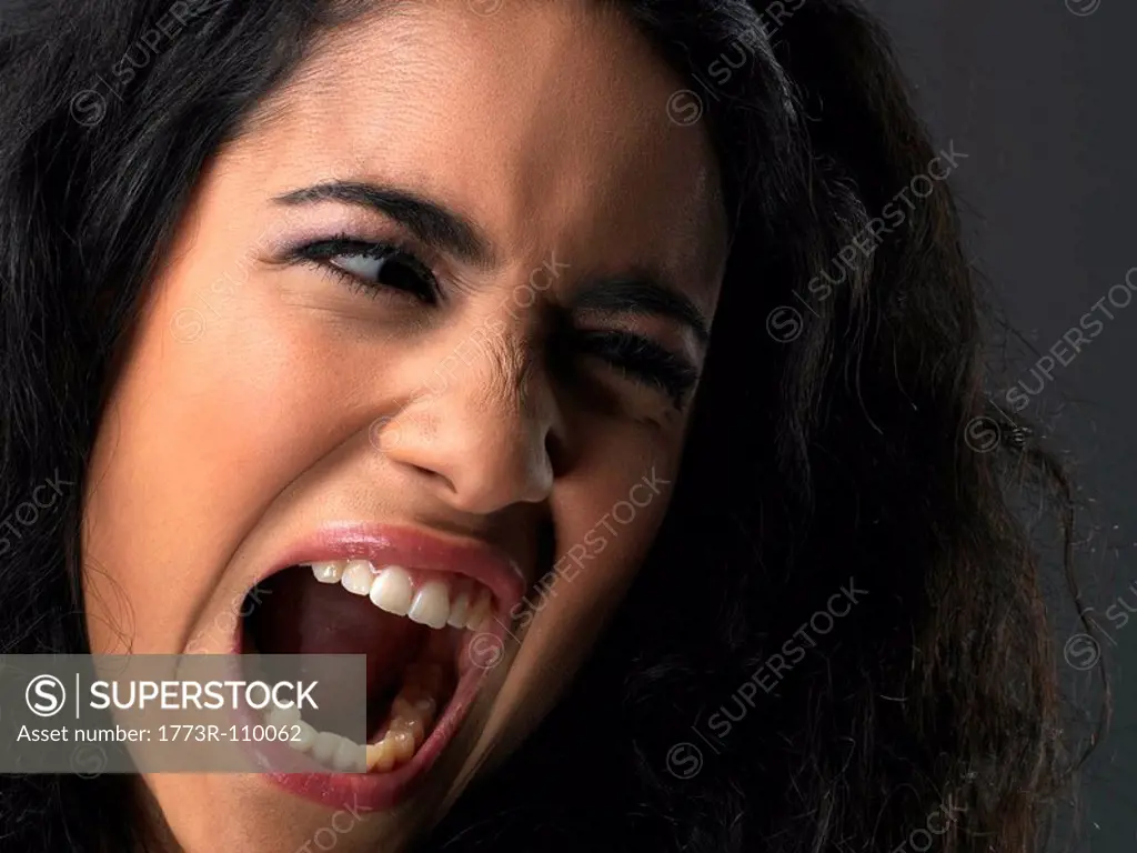 Young woman screaming