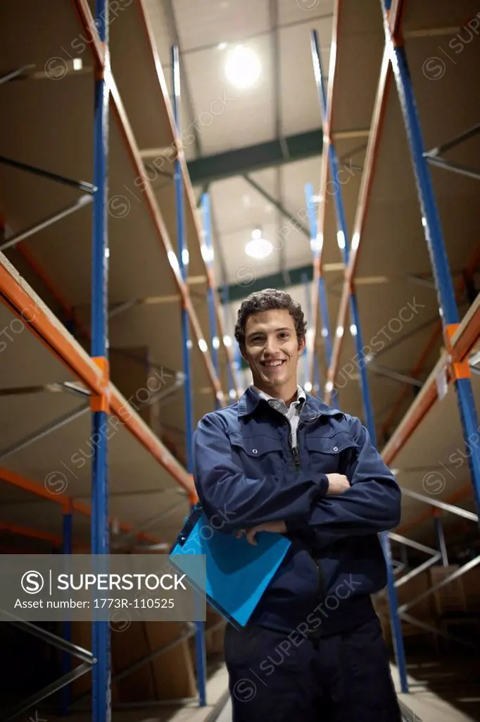 Worker in warehouse, portrait