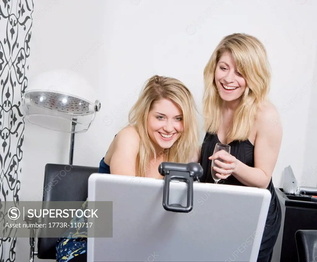 women at hairdressers with web cam