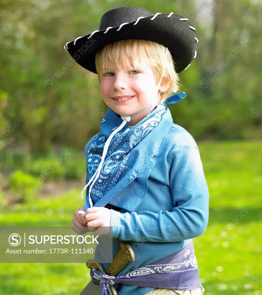 Boy wearing a cowboy costume