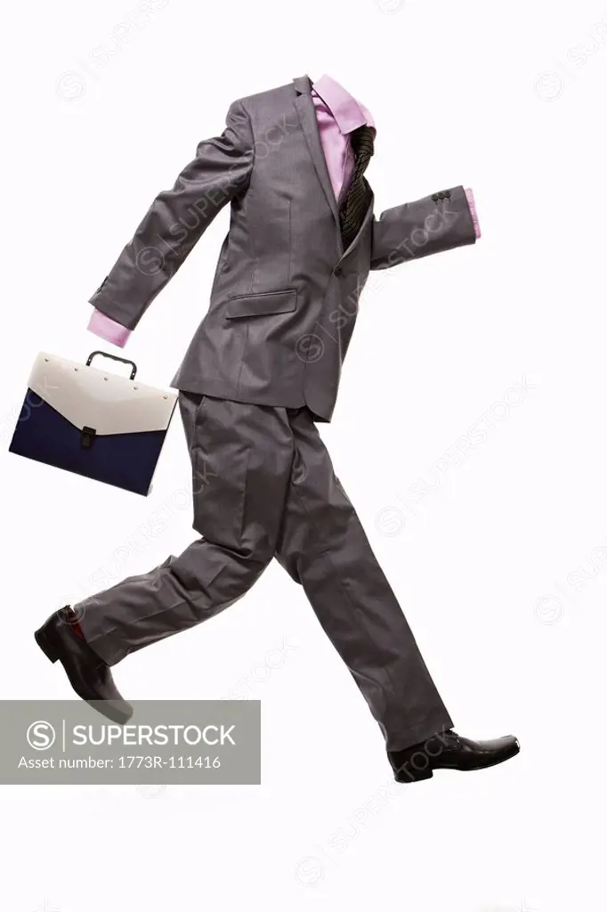 A male suit with briefcase, running