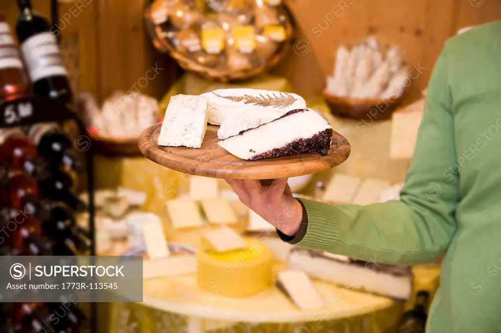 cheese, wine store owner in shop