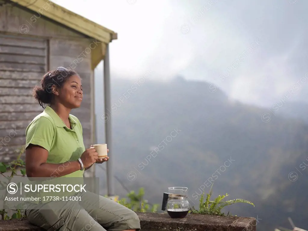 Female Coffee Worker Drinking Coffee