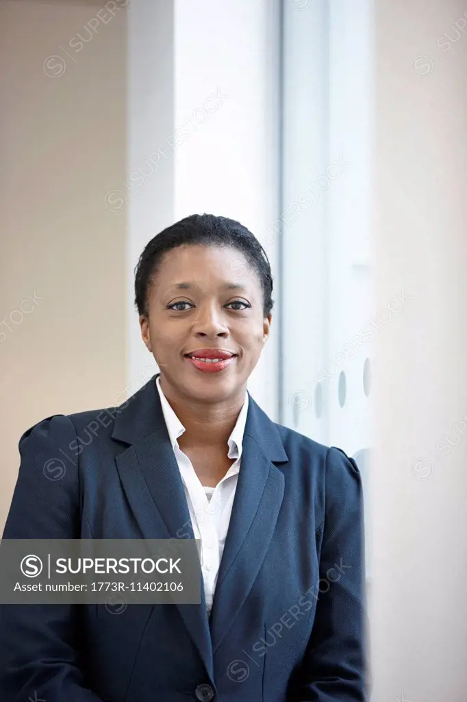 Portrait of businesswoman looking at camera