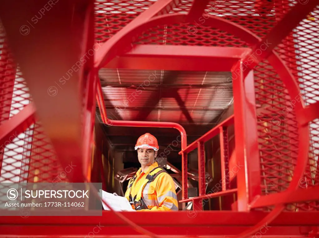 Crane Worker With Notes