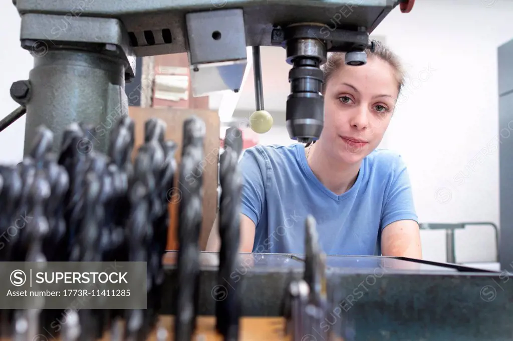 Portrait of female engineer in workshop
