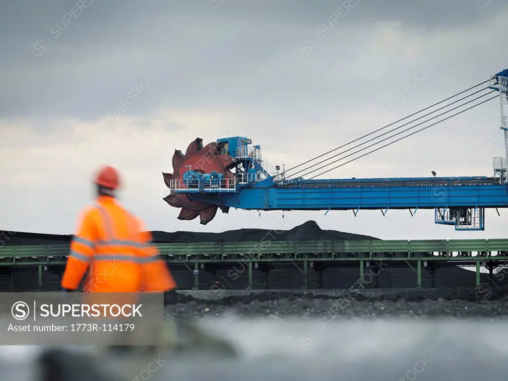 Port Worker With Heavy Machinery