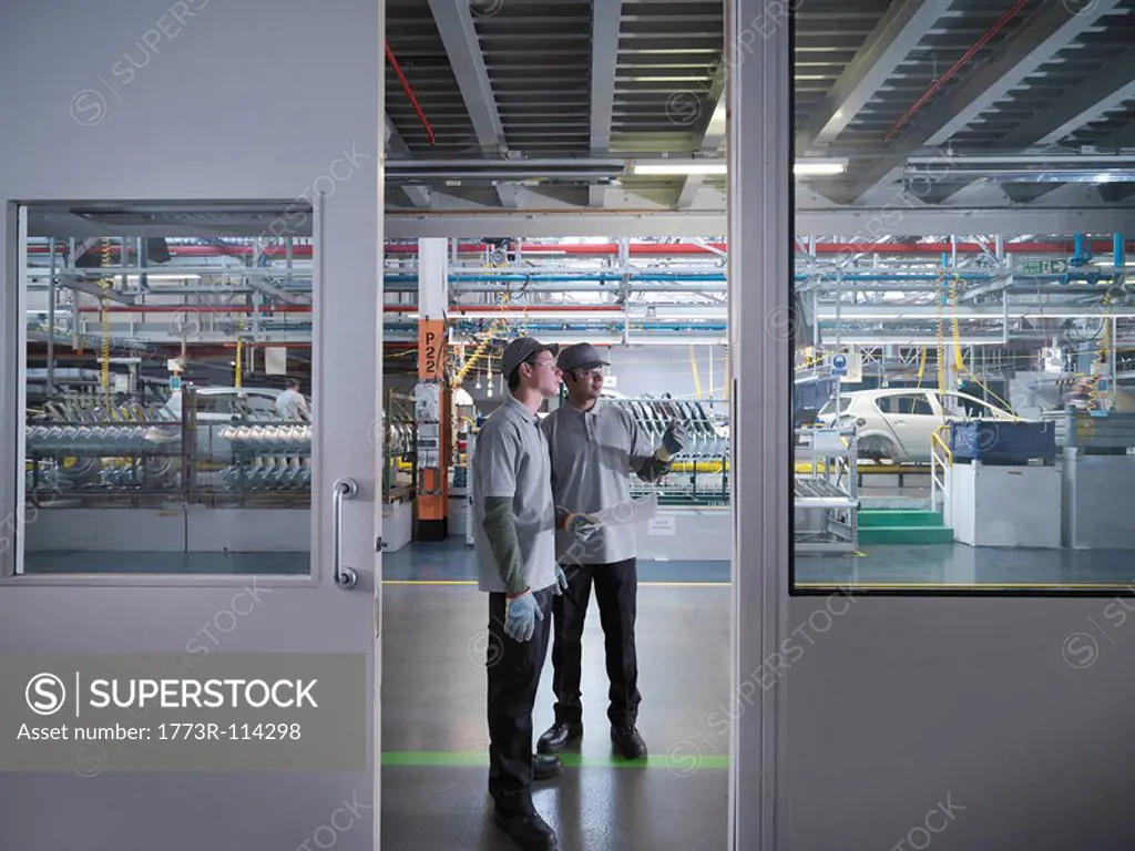 Car Plant Workers In Factory