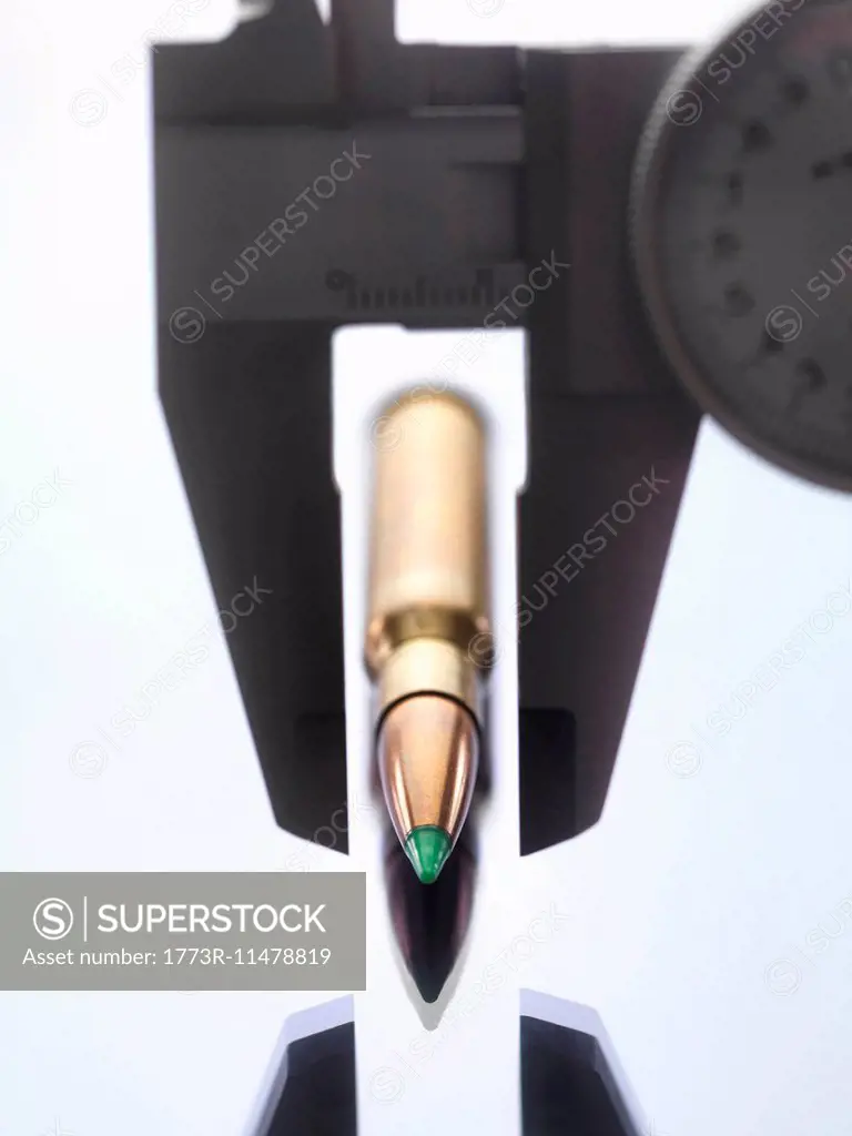 Calipers measuring bullet for forensic investigation