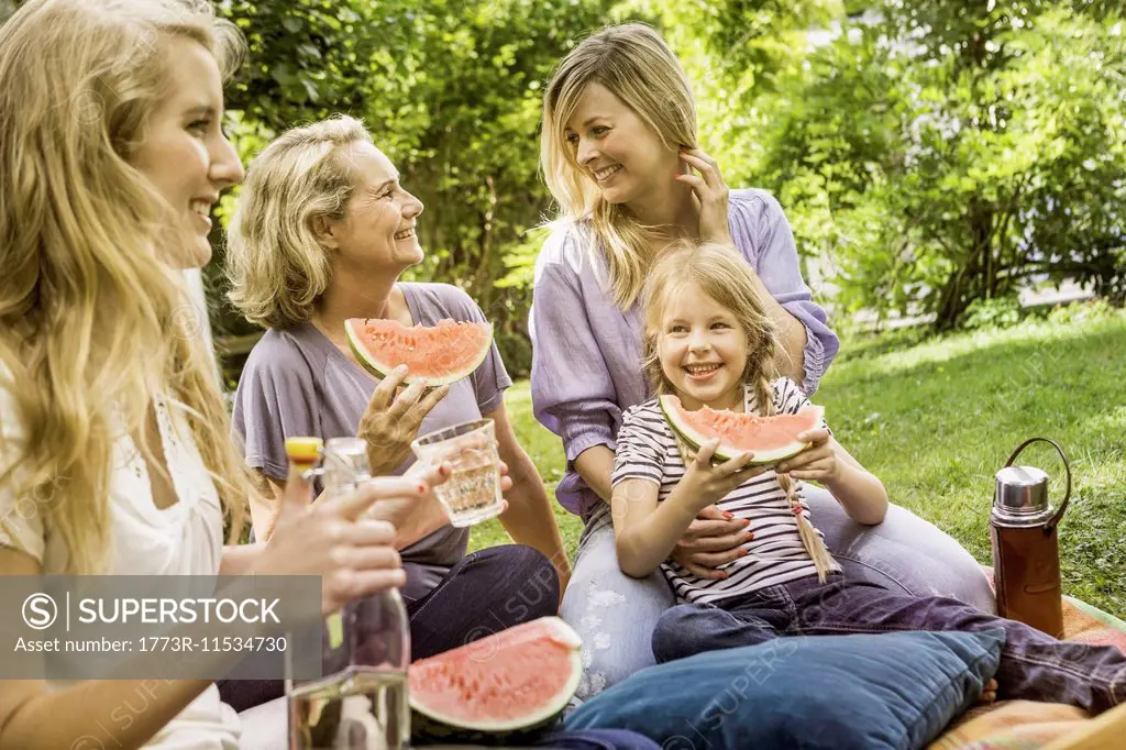 Three generation of women having picnic