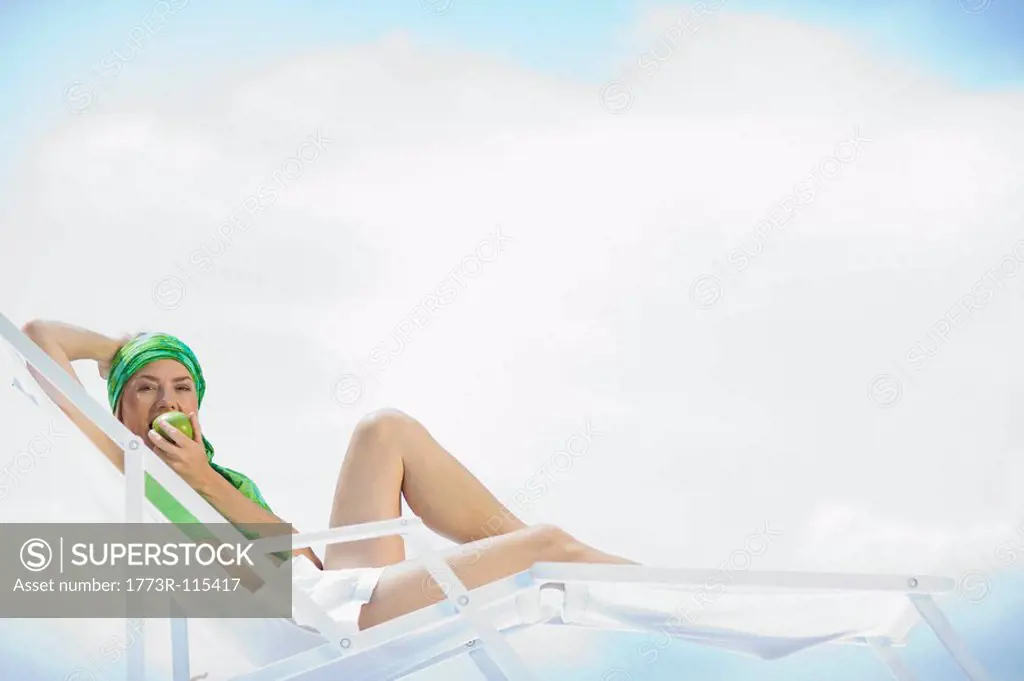 woman lying in a sun lounger