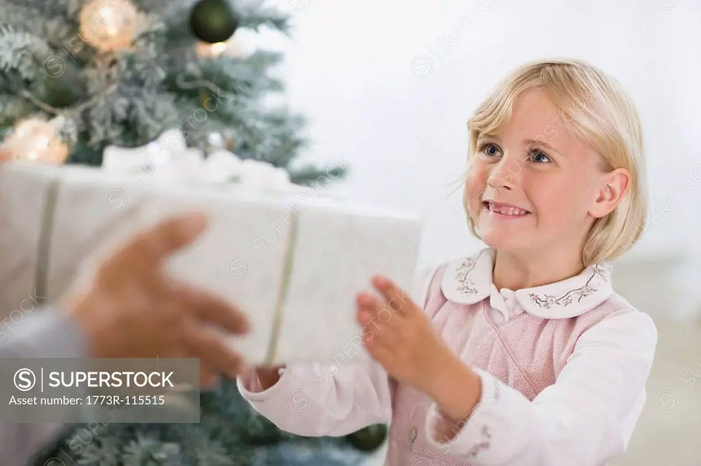 little girl getting a present