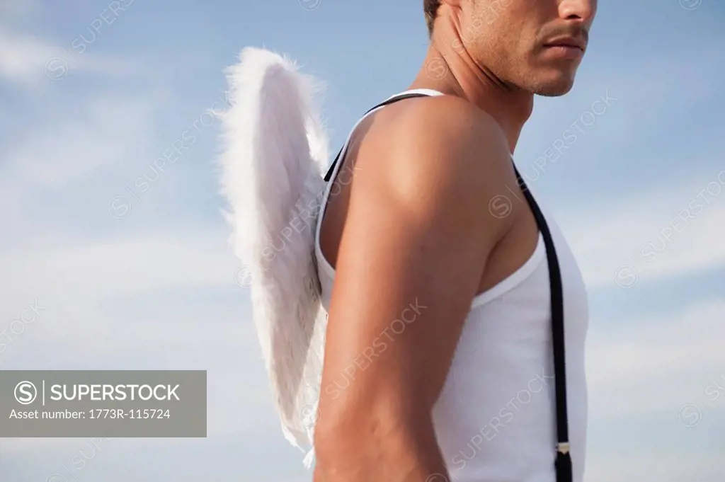 man wearing angel´s wings