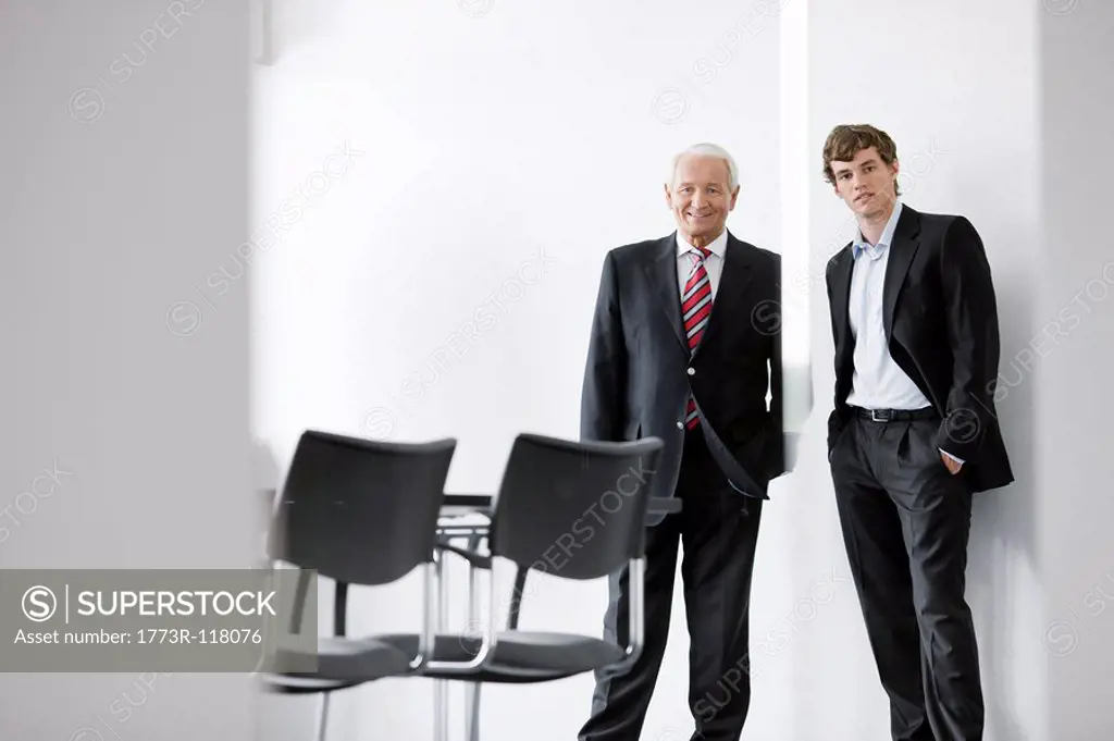 two businessmen in meeting room