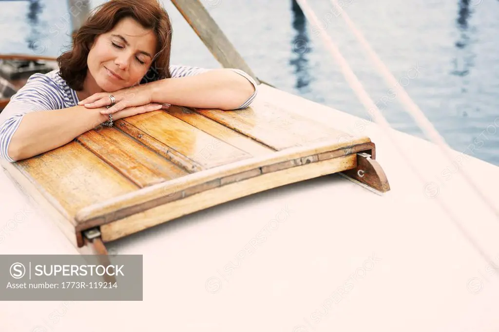 Middle aged woman on old boat