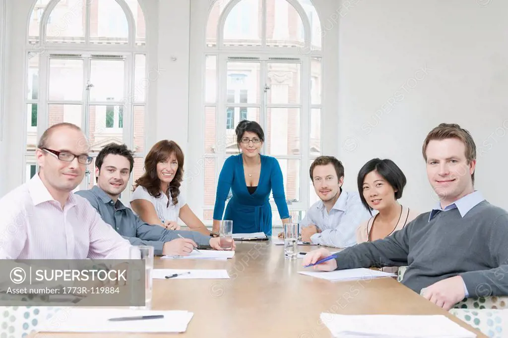Portrait of group at conference table