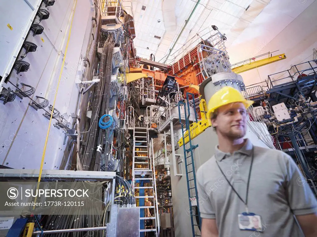 Scientist In Front Of Fusion Reactor