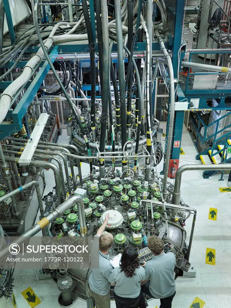 Fusion Reactor Scientists At Work