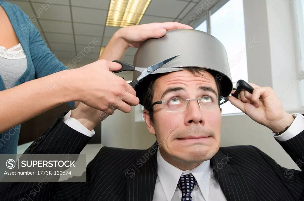 Business man having a hair cut