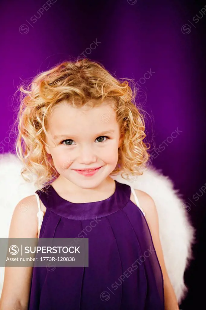 young girl in angel costume
