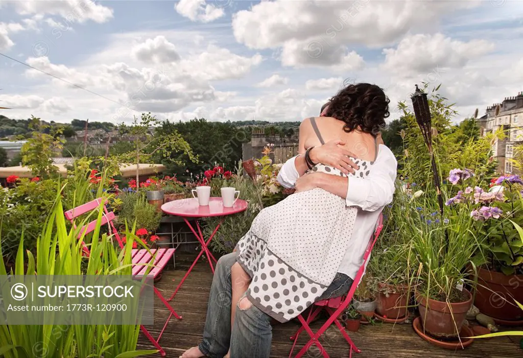 couple sitting on balcony